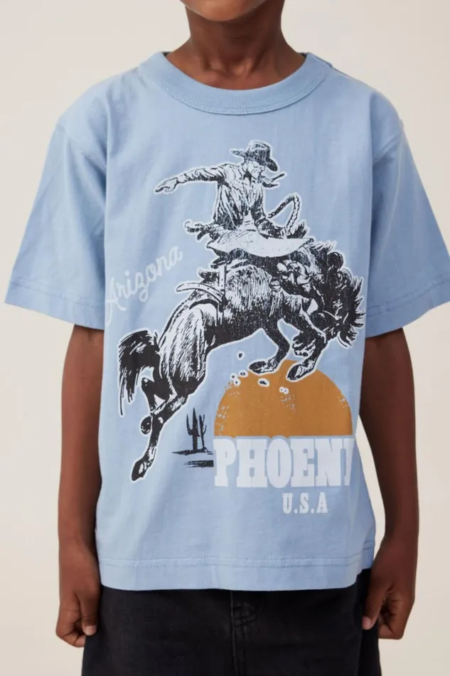 Boys Tops and TShirts Cotton On Jonny Short Sleeve Print Tee Dusty Bluephoenix Cowboy Boys Tops and TShirts Cotton On Jonny Short Sleeve Print Tee Dusty Bluephoenix Cowboy