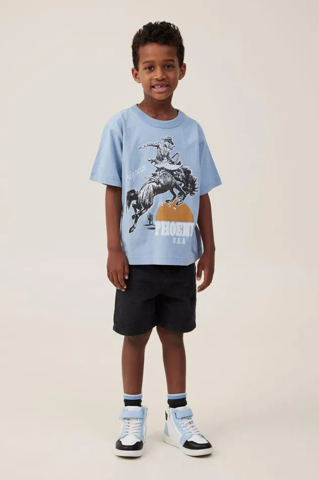 Boys Tops and TShirts Cotton On Jonny Short Sleeve Print Tee Dusty Bluephoenix Cowboy Boys Tops and TShirts Cotton On Jonny Short Sleeve Print Tee Dusty Bluephoenix Cowboy