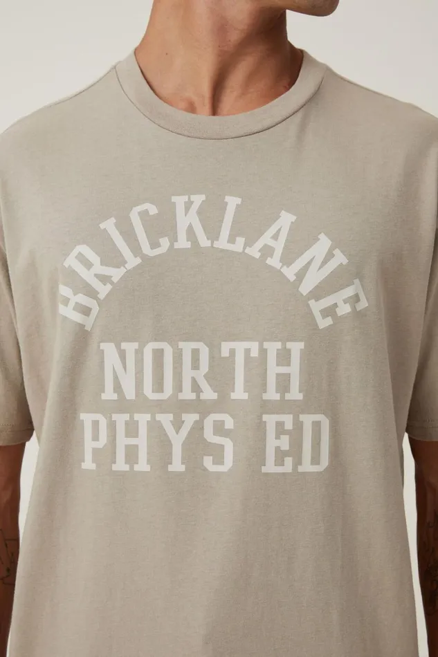 Men Tees and Tanks Cotton On Loose Fit College TShirt Gravel Stone Bricklane Phys Ed Men Tees and Tanks Cotton On Loose Fit College TShirt Gravel Stone Bricklane Phys Ed